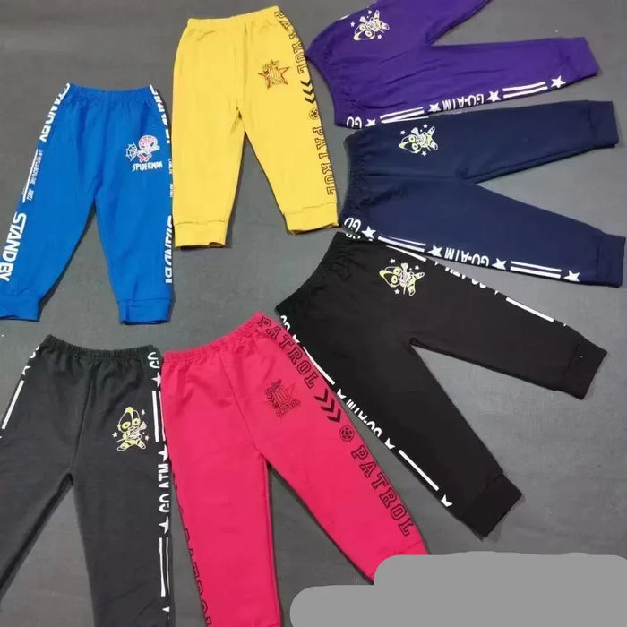 Colorful pants with branding on a gray background