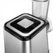 Close-up of a blender with a black and silver base on a white background