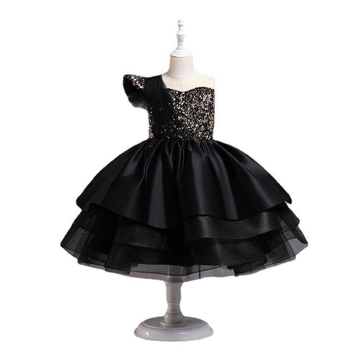 Black dress with sequined top on a mannequin against a white background
