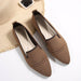 Pair of brown pointed-toe shoes with mesh design on a white background