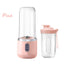 Pink portable blender with clear container on a white background