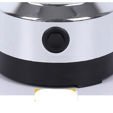 Stainless steel electric burner with a black button on a white background