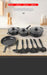 A 9-piece black non-stick cookware set displayed on a wooden surface, including three pots with lids, a frying pan, and six utensils. The image features Chinese text overlays highlighting the product features and sizes.