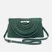 Green handbag with a unique design on a light gray background