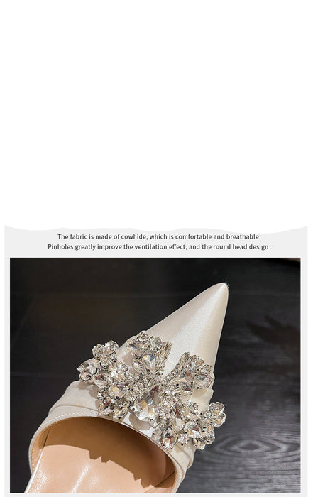 White shoe with decorative flowers on a dark background