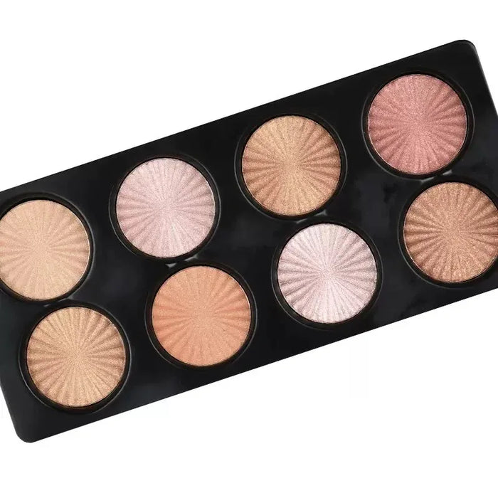 Makeup palette with eight circular shades on a white background