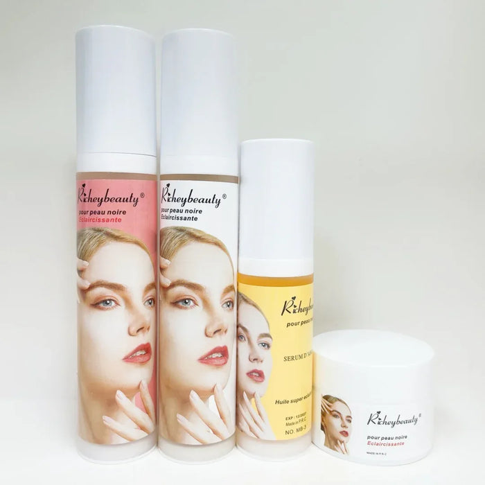 Three skincare product bottles with visible branding on a white background