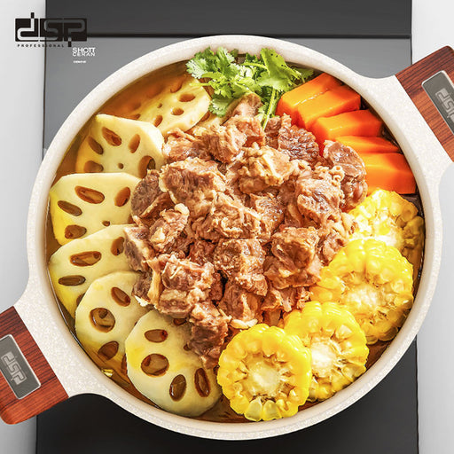 Stew with sliced vegetables in a pot on an electric stove