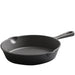 Black cast iron skillet on a white background