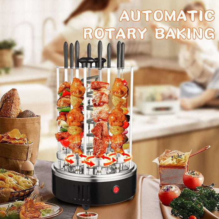 Automatic rotary baking device with skewered food on a kitchen counter.