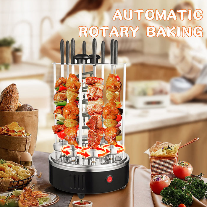 Automatic rotary baking device with skewered food on a kitchen counter.