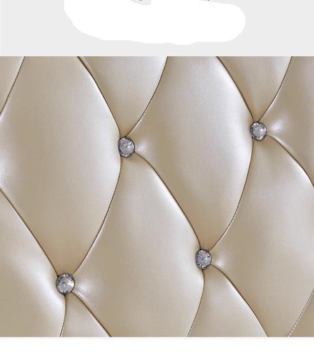 Beige leather headboard with diamond-like buttons on a white background