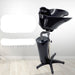 Black hair washing basin with stand on a white background