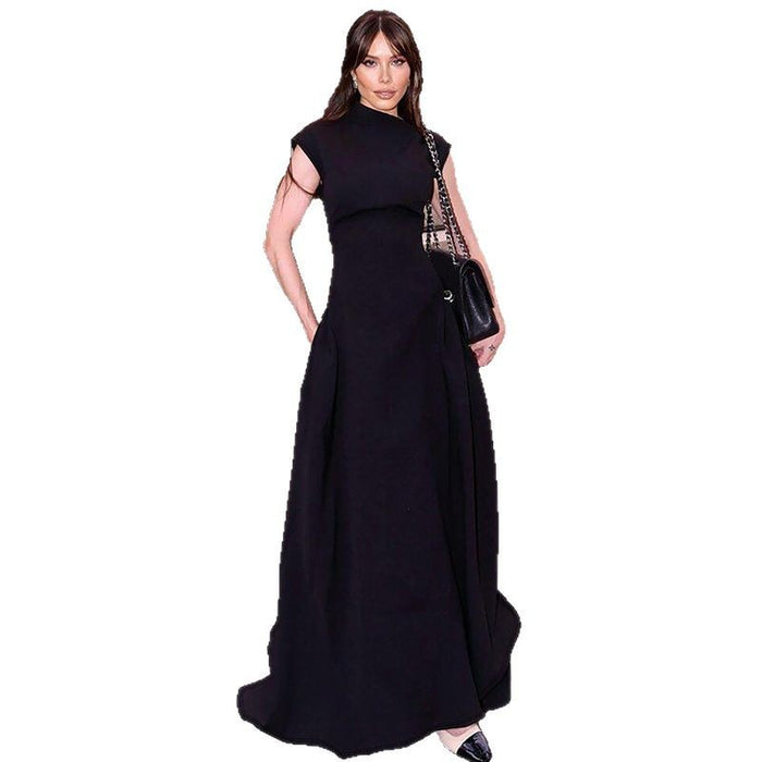 Woman wearing a black evening gown on a white background