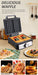 Waffle maker with waffles on a wooden table, surrounded by cooking utensils.