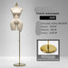 White female mannequin on a gold stand with size information displayed.