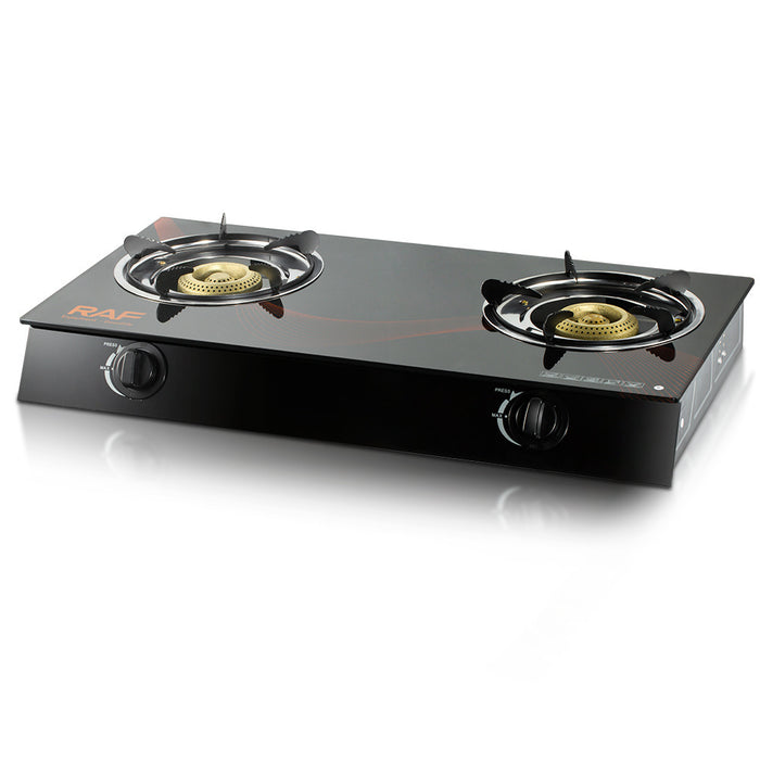 Black gas stove with two burners on a white background