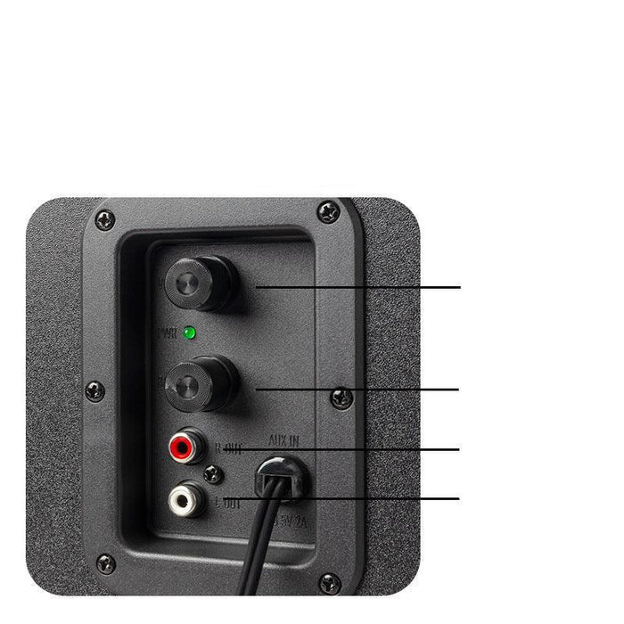 Back panel of a speaker with control knobs and audio connectors on a white background