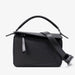 Black handbag with a strap on a white background