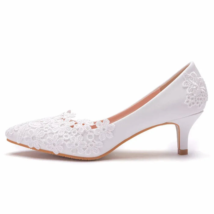 White shoe with lace details on a white background