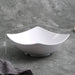 White ceramic bowl with measurements on a gray background