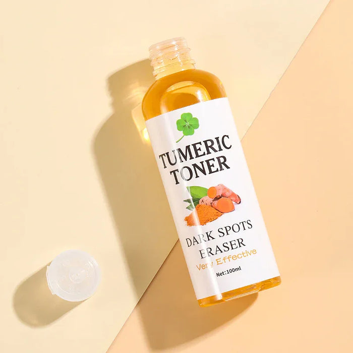 Bottle of Tumeric Toner on a beige background