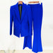 Blue suit with a blazer and pants on hangers against a white background