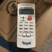 Air conditioner remote control with 'Royal' branding on a cardboard background