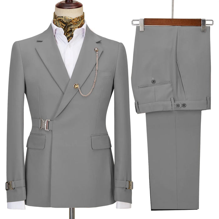 Gray suit jacket and pants on a mannequin with a white shirt underneath.