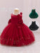 Red flower girl dress on a mannequin with inset images of green and black dresses.