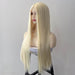 Blonde wig on a mannequin head against a plain background