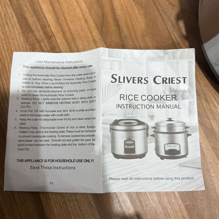 Slivers Priest rice cooker instruction manual on a wooden surface
