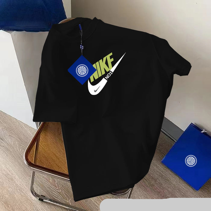 Black hoodie with Nike logo on a chair against a white wall