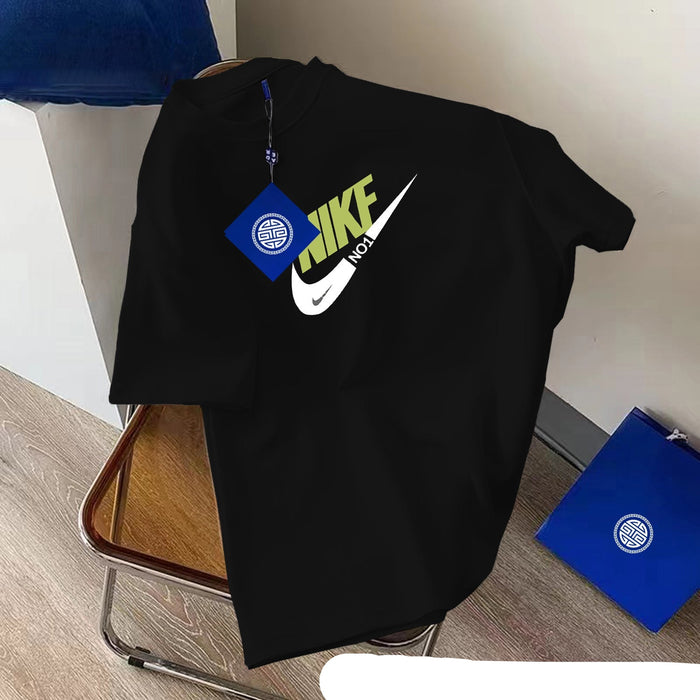 Black hoodie with Nike logo on a chair against a white wall