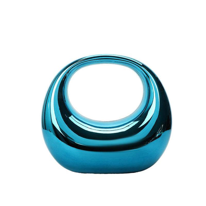 Moon-Shaped Acrylic Handbag: Chic Crescent Clutch for Spring 2025 - Dio Kollections