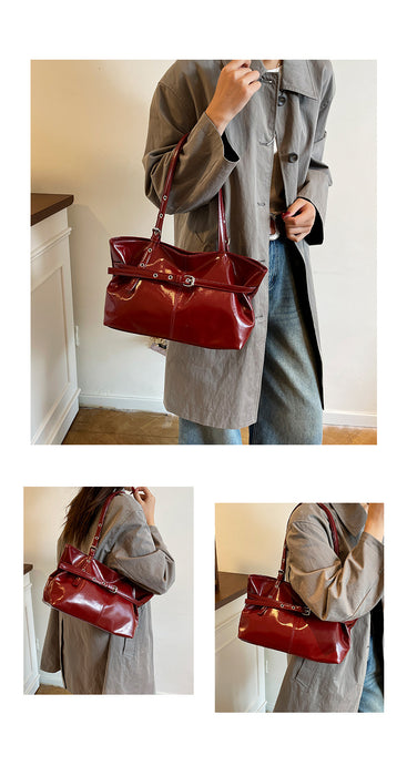 A collage showing a person wearing a long taupe coat and carrying a shiny deep red tote bag in an indoor setting. The main panel is the largest, with two smaller side panels below showing additional angles of the bag being worn over the shoulder.