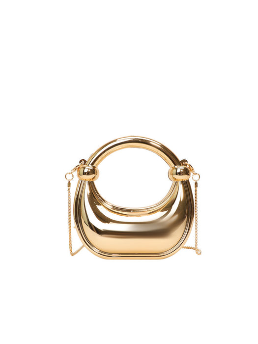 Gold handbag with chain detail on a white background