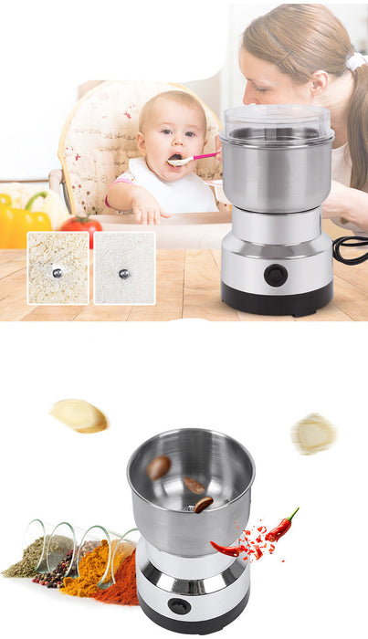 Small food processor with a woman and child in the background, surrounded by ingredients.