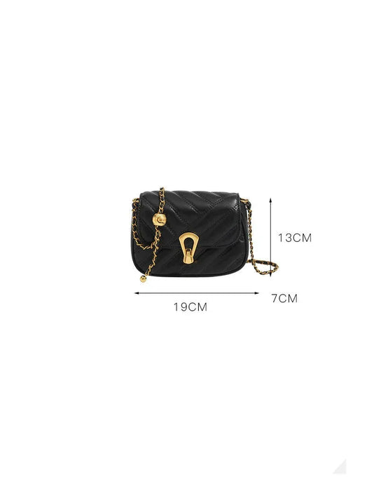 Black quilted handbag with gold chain and lock on a white background, showing dimensions and product details.
