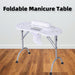 Foldable manicure table with a nail lamp on a wooden floor