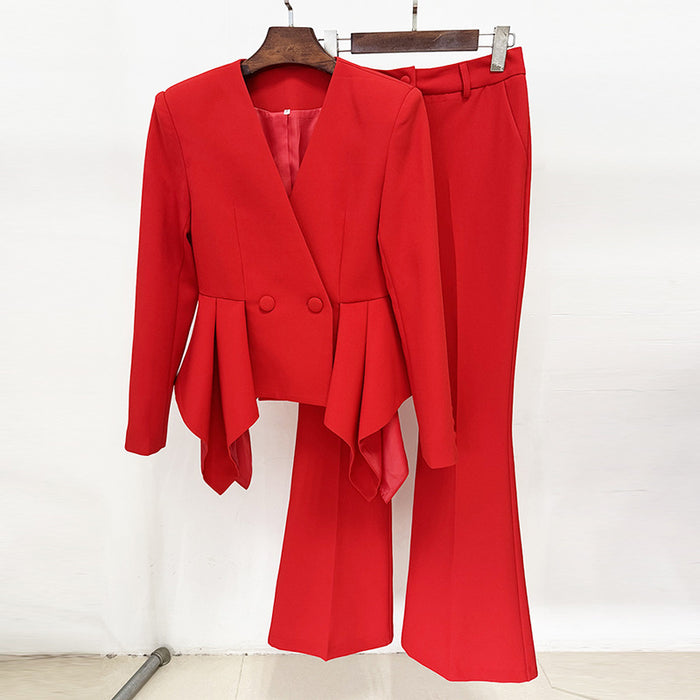 Red suit on a hanger against a white background