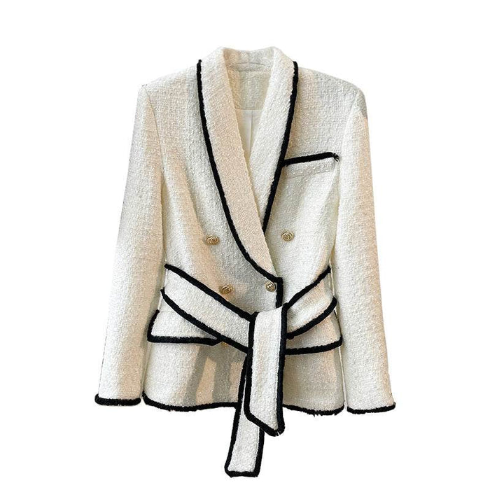 white textured coat with white trim and gold buttons on a white background