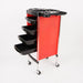 Red and black rolling cart with multiple drawers on a white background