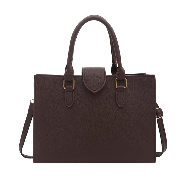A dark brown pebbled leather tote bag with dual top handles, a central flap detail, and a detachable shoulder strap, shown against a plain white background.