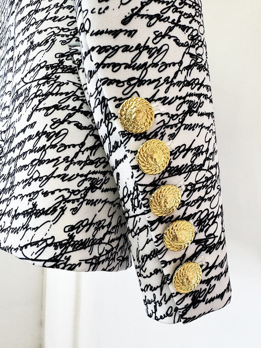Black and white patterned coat with gold buttons on a white background