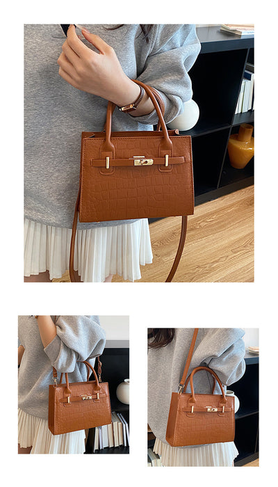 A brown crocodile-embossed leather handbag with gold-tone hardware, shown in a three-panel collage. The main panel features a model wearing a gray sweatshirt and white pleated skirt holding the bag.