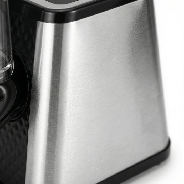 Close-up of a stainless steel coffee maker on a white background