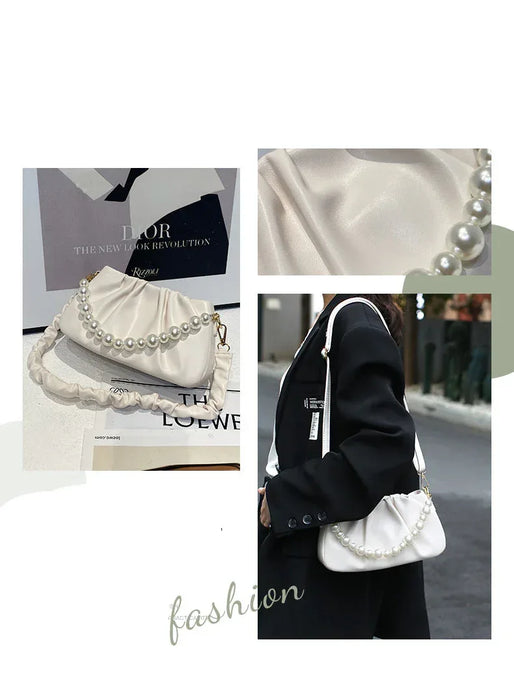 White handbag with pearl details on a magazine and street background