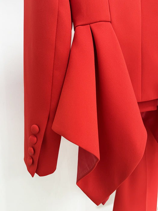 Red garment with a large bow detail on a white background