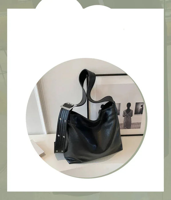 Black handbag on a white background with text overlay